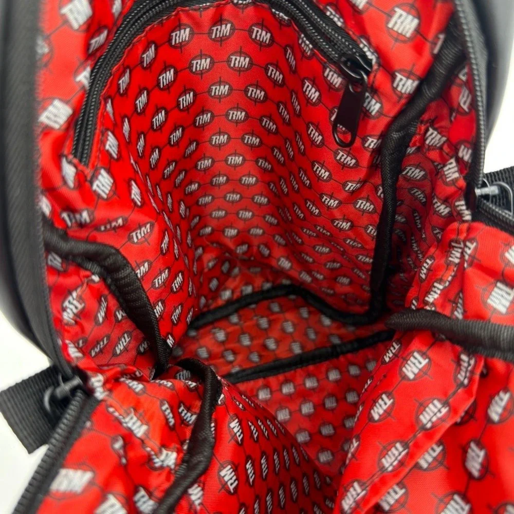 The Running Man TRM Mini Backpack / Sling‎ Bag – NWOT